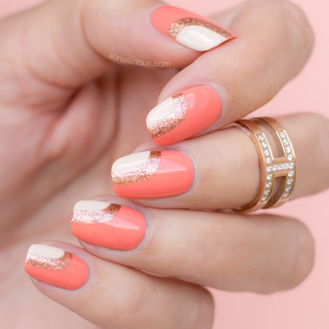 Vibrant Coral Chic Nail Design with White Accents and Sparkling Gold Geometric Pattern