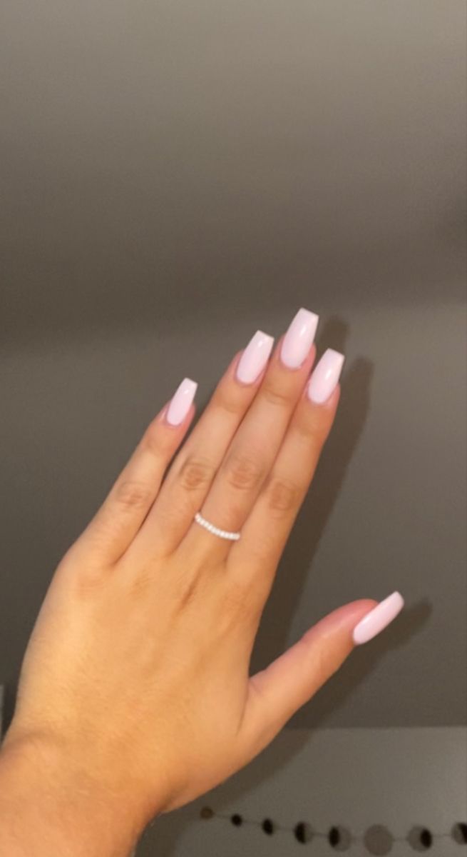 Chic Soft Pink Long Nails: A Sophisticated and Feminine Touch.