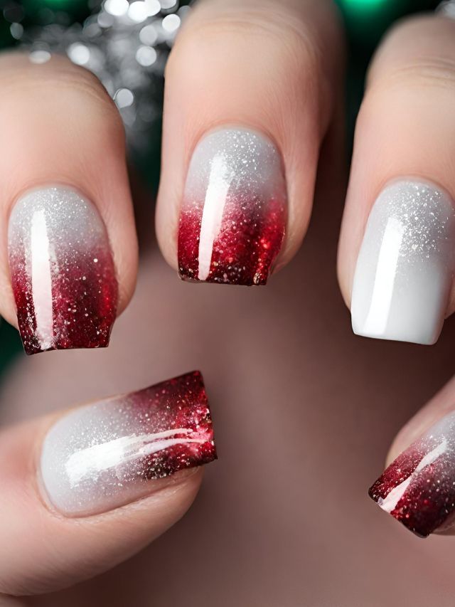 Stunning Red and White Ombre Gradient Nail Design with Glitter Accents for Festive Elegance.