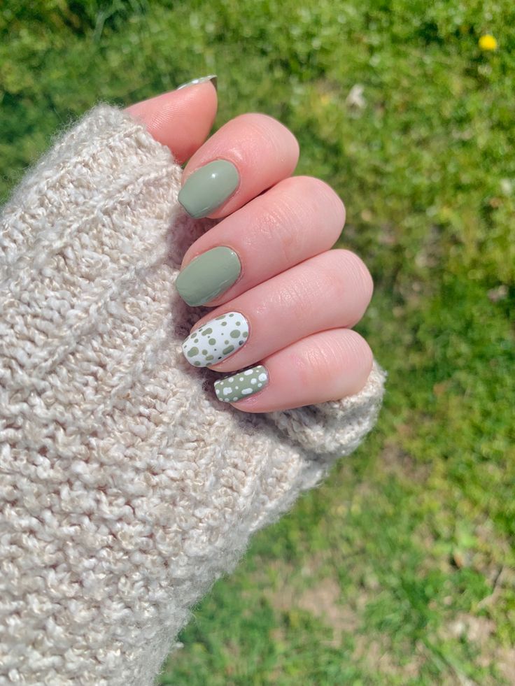 Fresh Spring-Inspired Nail Design with Soft Green Palette and Whimsical Polka Dots