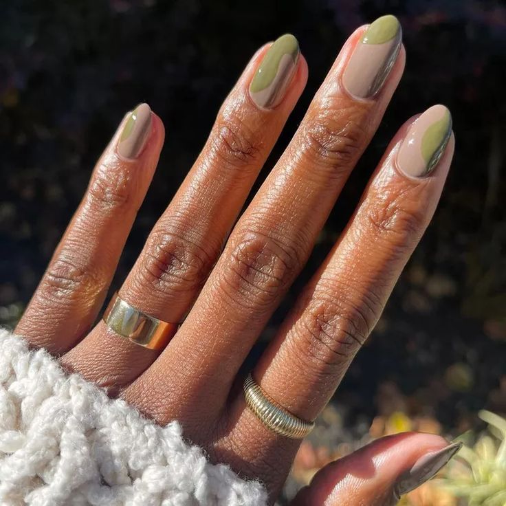 Chic Earthy Nail Design: Olive Green and Nude Almonds with Gold Accents