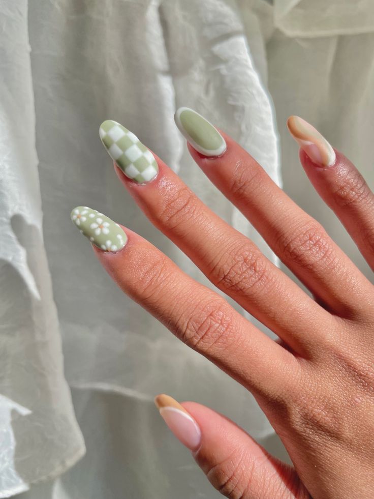 Playful Pastel Nail Design with Mixed Patterns and Finishes