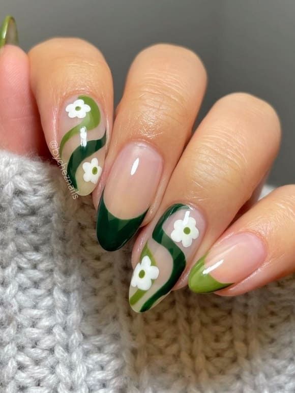 Trendy Floral Nail Design: Playful Green Shades with Elegant White Flowers