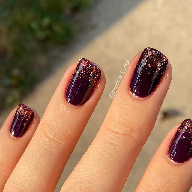 Captivating Elegant Purple Nails with Glossy Finish and Glitter Gradient.