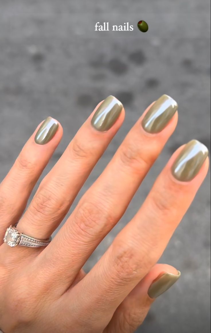 Elegant Autumn-Inspired Nail Design in Muted Olive Green with Glossy Finish.