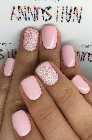 Elegant Soft Pink Manicure with Glossy and Glitter Finishes