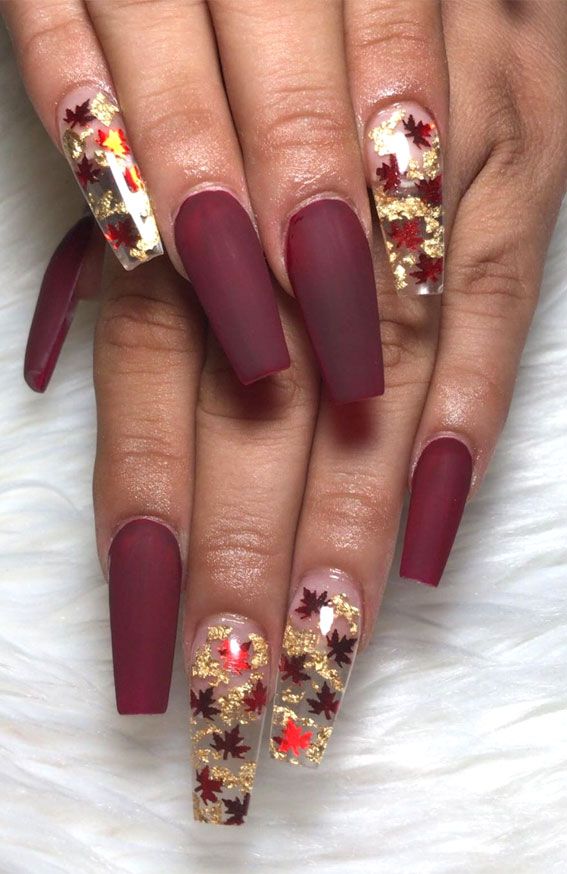 Elegant Autumn Nail Design: Rich Burgundy Base with Gold Foil and Fall Leaves Accents