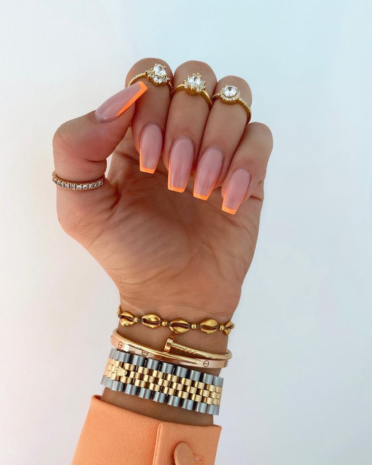 Chic Gradient Almond Manicure with Elegant Accessories for a Fashion-Forward Look