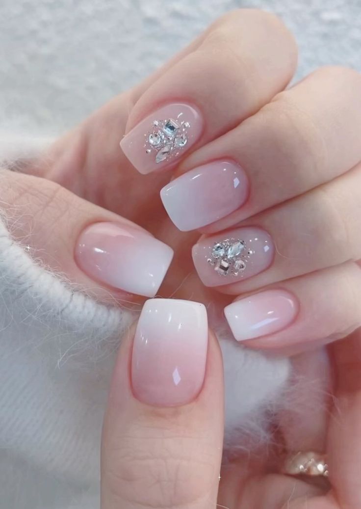 Chic Ombre Nails with Gemstone Accents: A Versatile and Sophisticated Look.