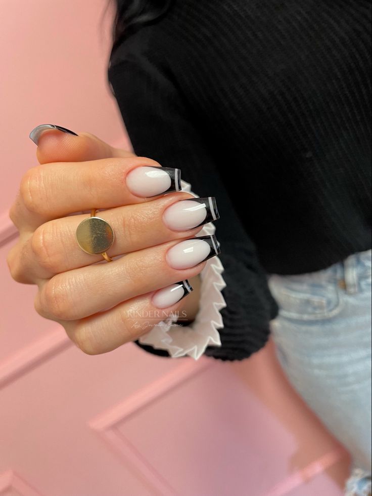 Chic French Manicure: Soft Beige with Striking Black Tips for Modern Elegance.