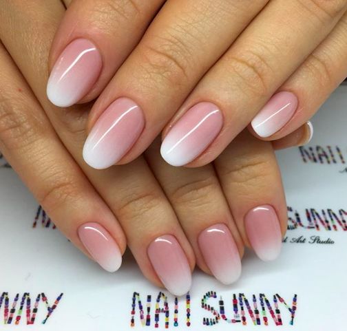 Elegant Ombre Nail Design with Delicate Pink to White Gradient.