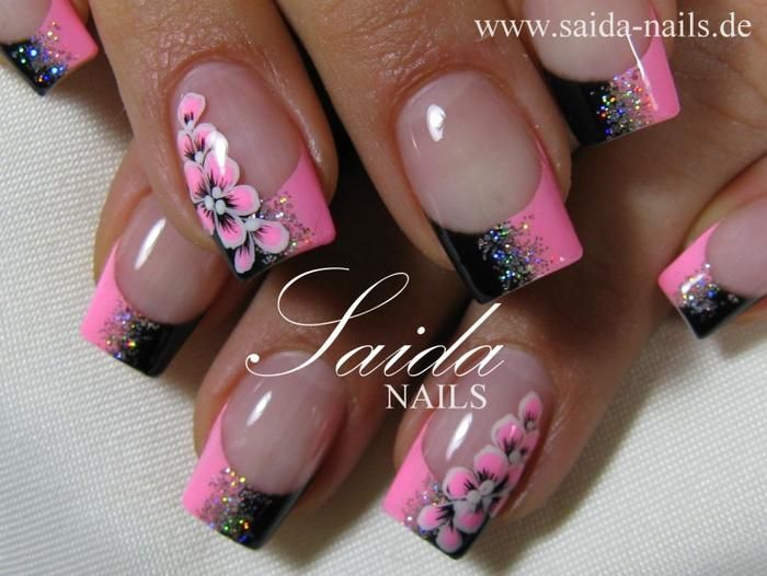 Striking Pink and Black Nail Design with Gradient, Sparkles, and Floral Accents