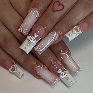 Romantic Ombre Nail Design with Soft Pink to White Gradient and Accents of Hearts and Pearls.