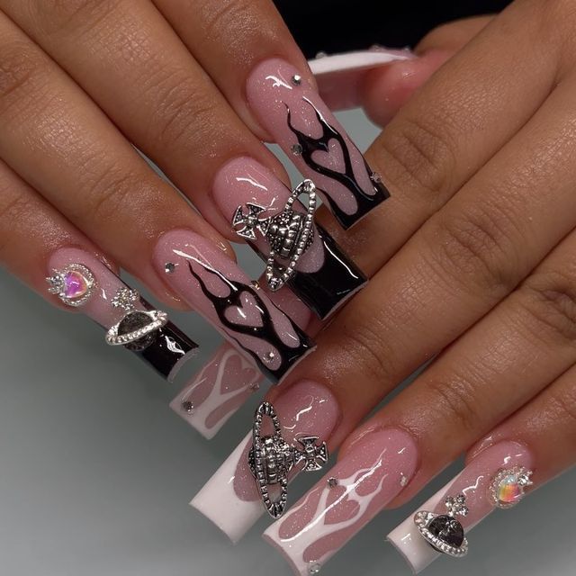 Playful Yet Edgy Stylish Nail Design with Glossy Pink and Black Accents