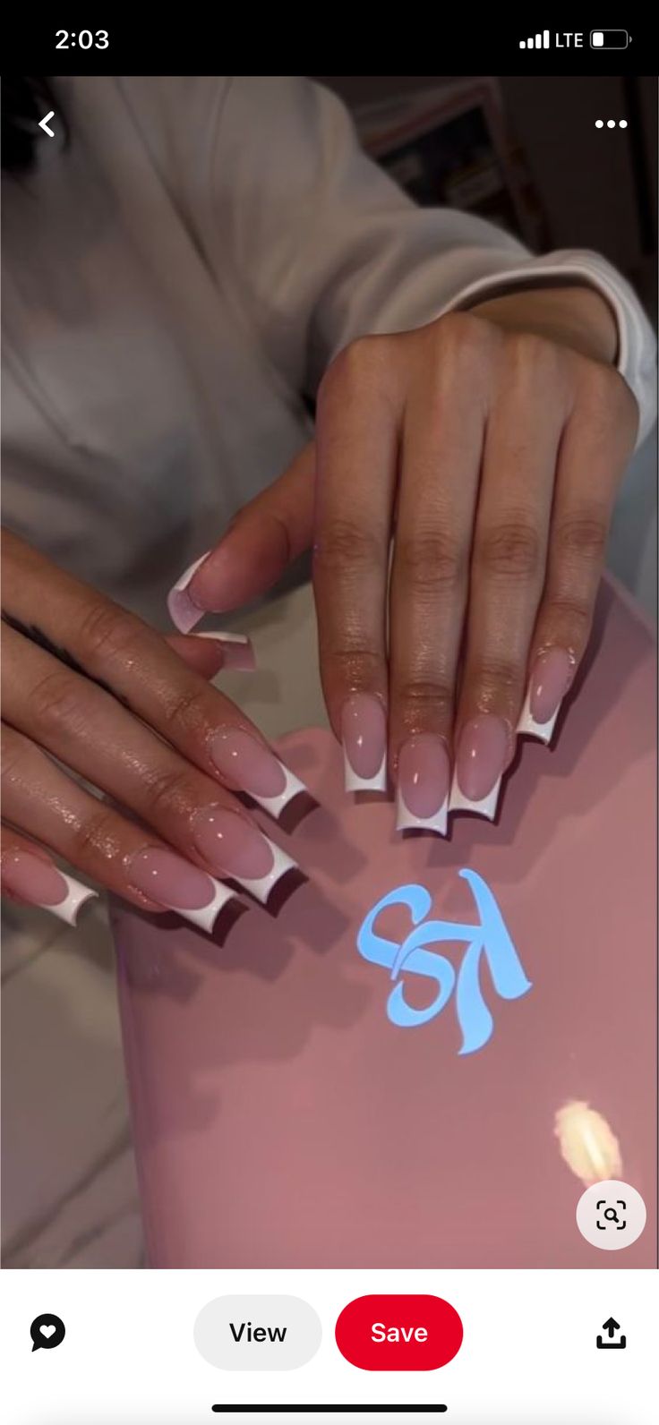 Chic Soft Pink and White Tip Manicure for Effortless Elegance