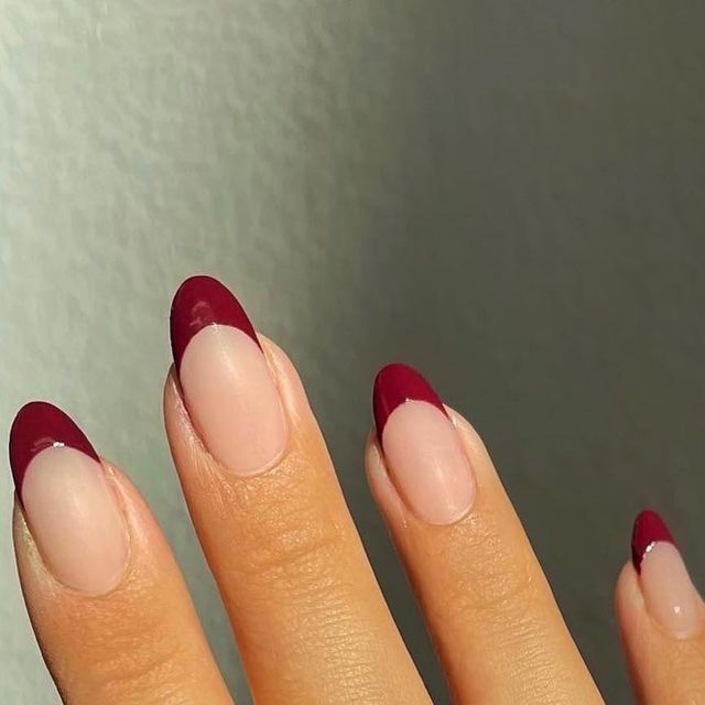 Chic Burgundy French Tip Manicure: Versatile Elegance for Any Occasion.