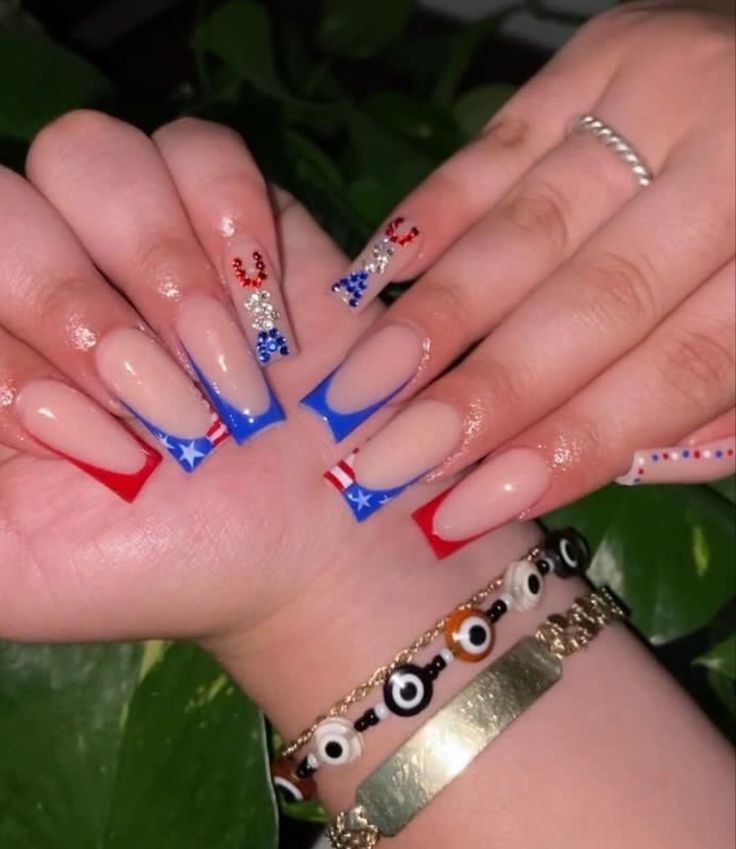 Vibrant French Tip Nail Design with Bold Red and Blue Accents for Festive Celebrations