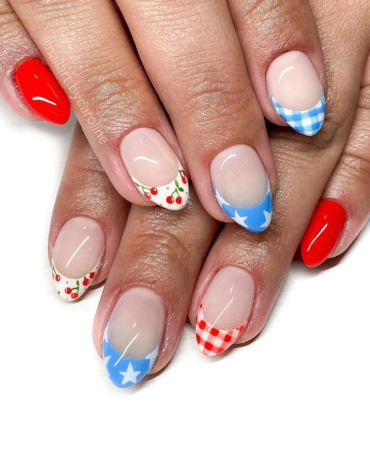 Vibrant and Whimsical Colorful Nail Designs with Cherry Motifs and Star Patterns