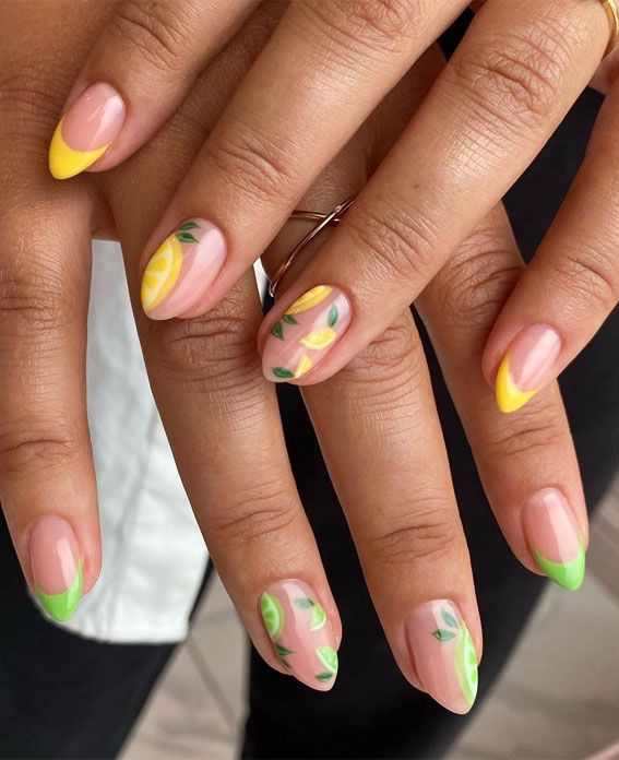 Cheerful Summer Nail Design with Colorful Fruit Motifs on Pink Base