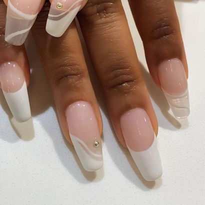 Chic Nail Design: Soft Pink and White Waves with Rhinestone Accents for Versatile Elegance