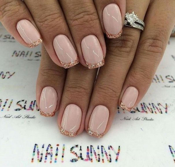 Chic Nude Nails with Delicate Rose Gold Glitter French Tip