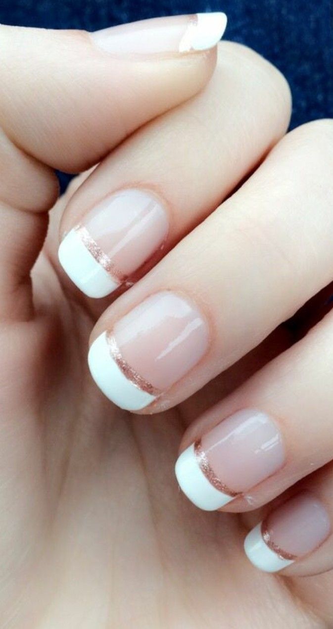 Sophisticated French Tip Nail Design with Chic Rose Gold Accents