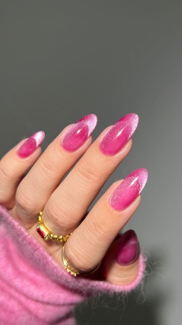 Chic Ombre Pink Acrylic Nails with Sparkling Gradient and Elegant Almond Shape.