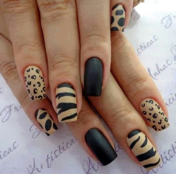 Bold Animal Print Nail Design with Matte Black and Beige Tones