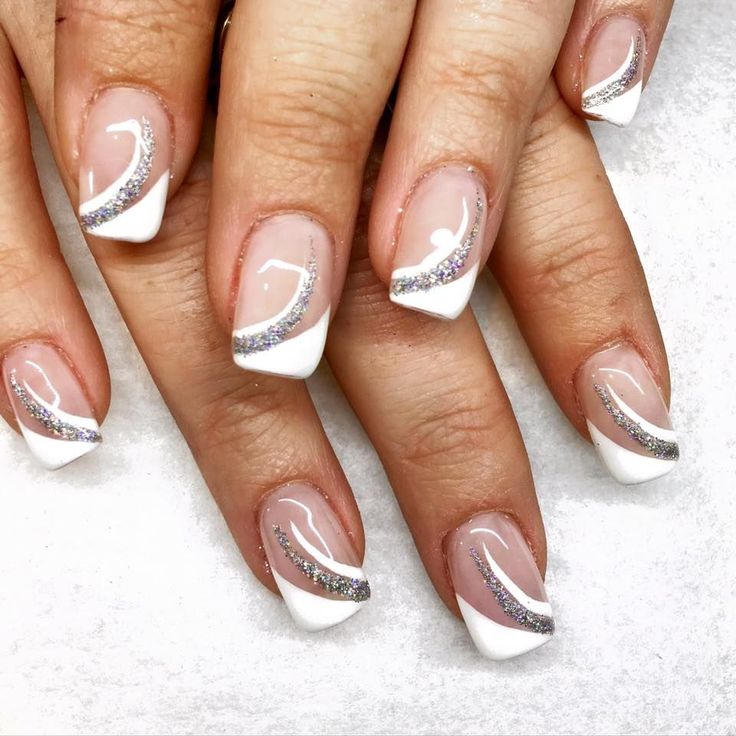 Sophisticated French Tip Nail Design with Shimmering Silver Accents