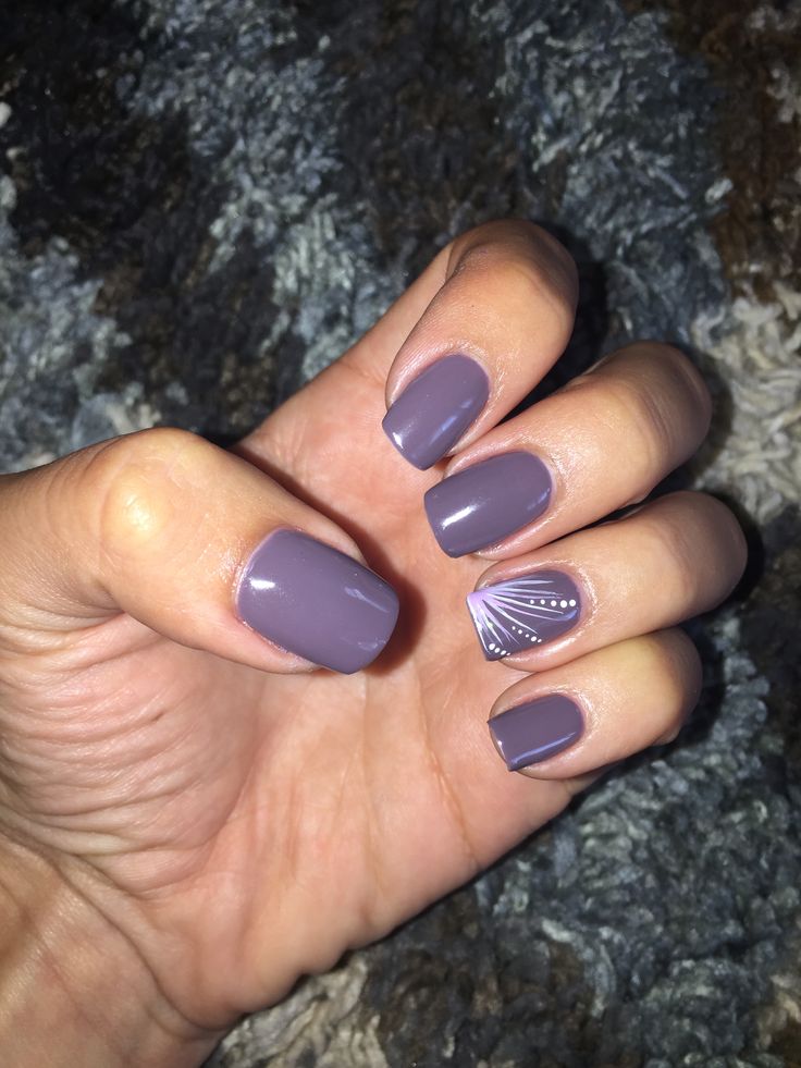 Sophisticated Muted Mauve Nail Design with Intricate Detailing.