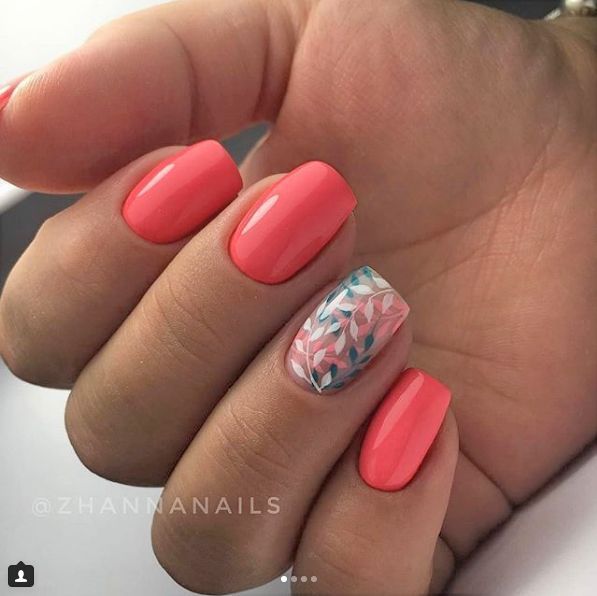 Vibrant Coral Nail Design with Elegant Foliage Accent.