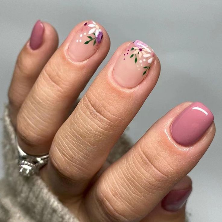 Elegant Floral Nail Design in Soft Pink and Nude Shades