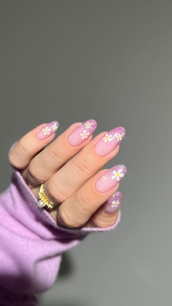 Whimsical Floral Nail Design with Soft Pink Gradient and Sparkling Accents