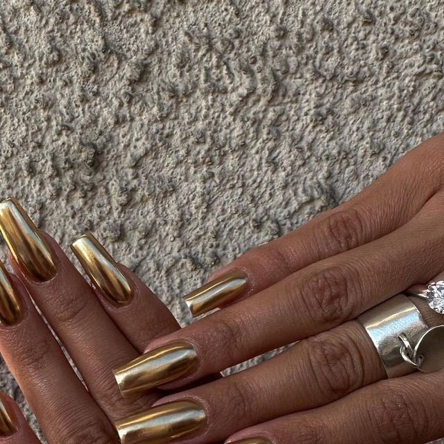 Elegant Gold Nail Design with Metallic Finish for a Bold Statement.