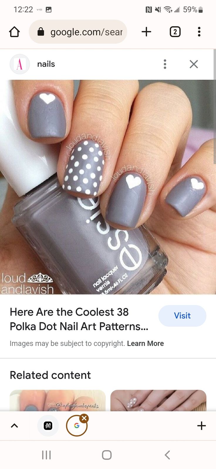 Sophisticated Chic Nail Design with Gray Base, Polka Dots, and Heart Accent