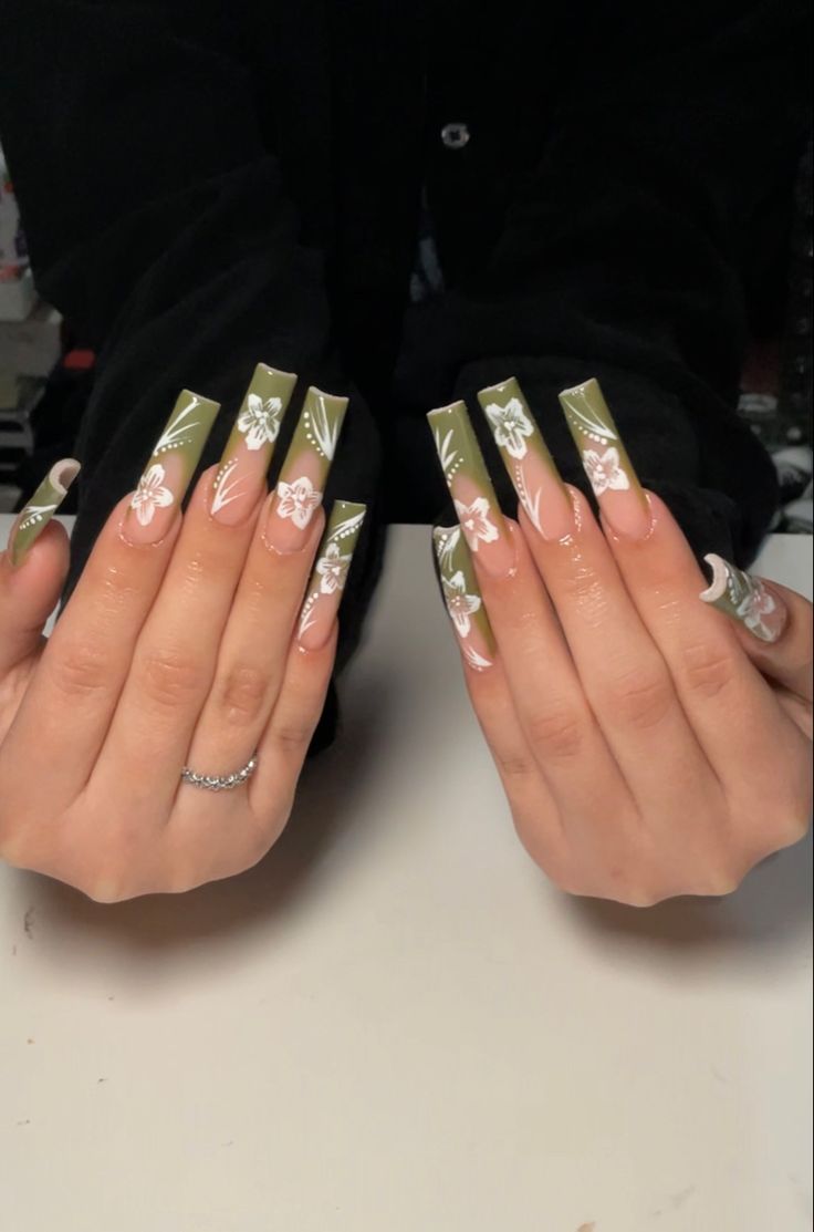 Chic Olive Green Nail Design with Delicate Floral Patterns in White and Pink.