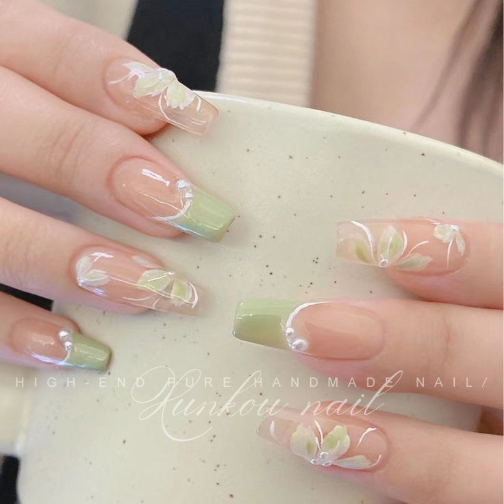 Elegant Gradient Nail Design with Intricate Floral Patterns for Any Occasion