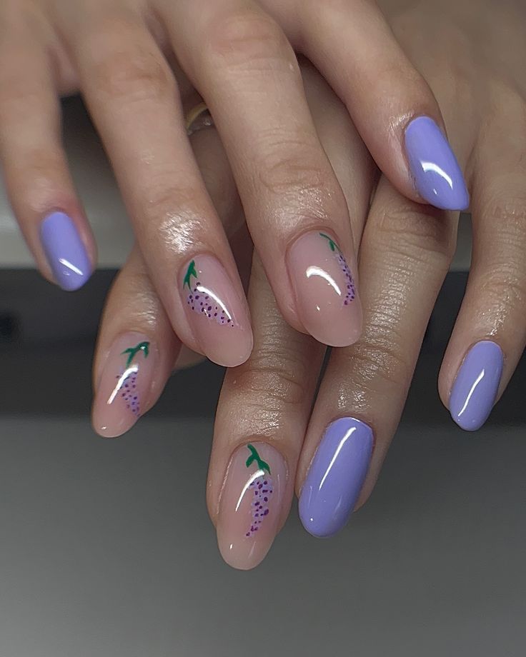 Whimsical and Elegant Lavender and Nude Nail Design with Floral Accents