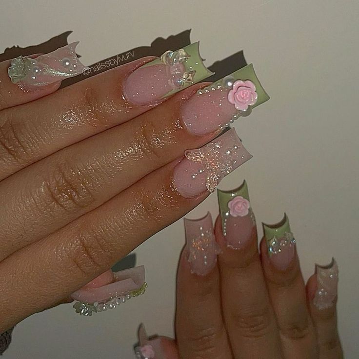 Sophisticated Elegant Nail Design with Soft Pink Base and Floral Accents