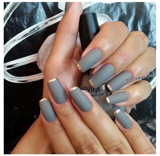 Sophisticated Matte Gray Nails with Chic Metallic Gold Tips: A Timeless Trend.