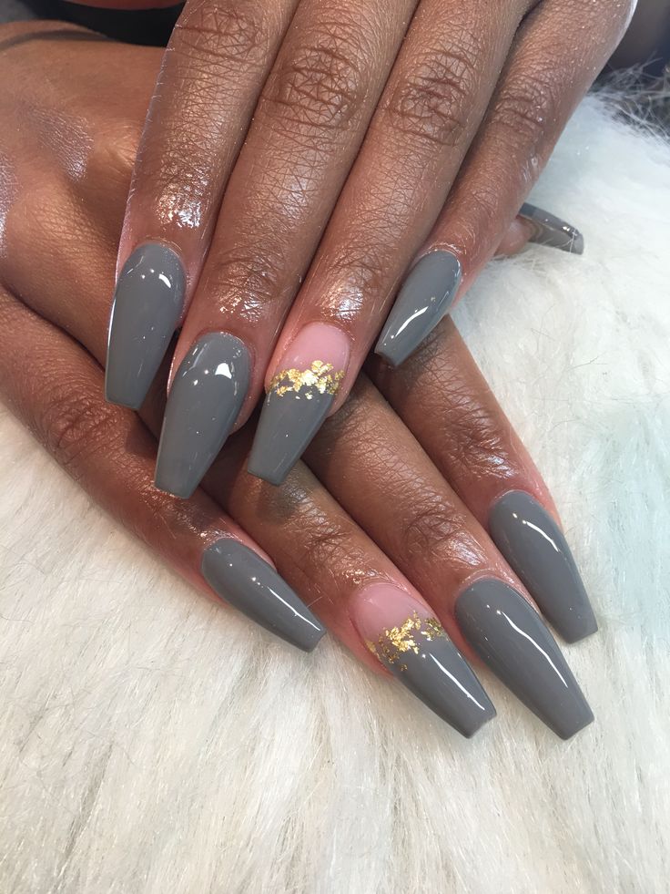 Sophisticated Gray Nails with Glamorous Gold Accent Detail.