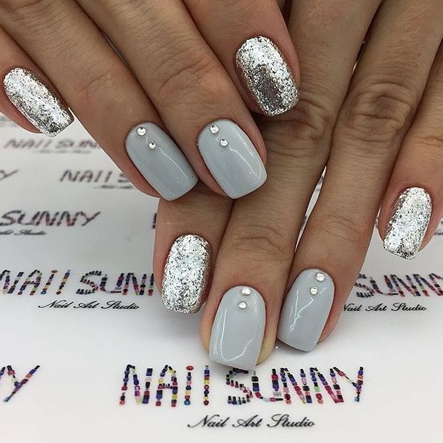 Chic Gray and Silver Glitter Manicure with Rhinestone Accents.