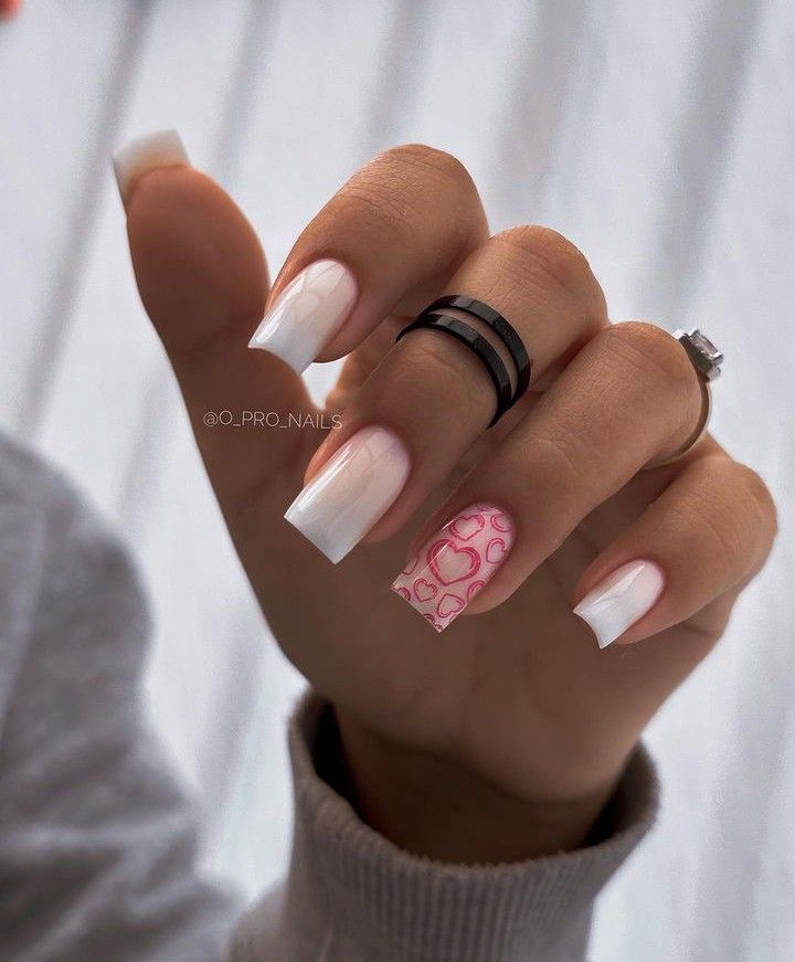 Chic French Manicure with Heart Accents: A Perfect Blend of Sophistication and Playful Charm