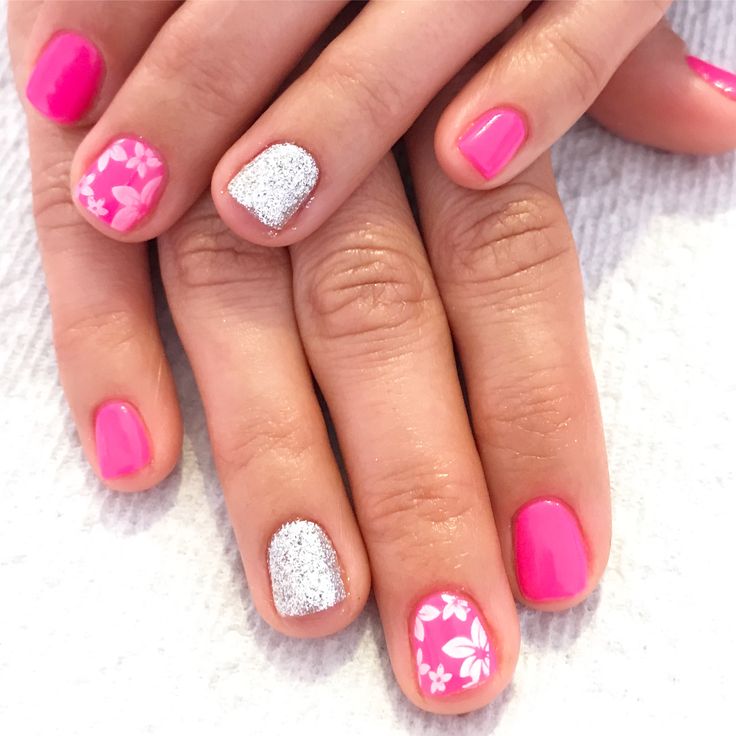 Playful Pink Nail Design with Glossy and Textured Accents