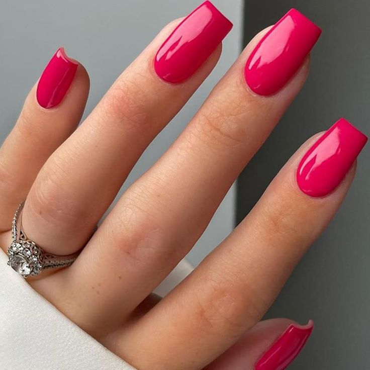 Bold Vibrant Pink Glossy Square Nails for Any Occasion.