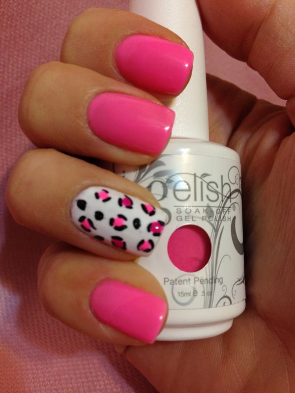 Playful Bold Pink Manicure with Striking Leopard Print Accent Nail.