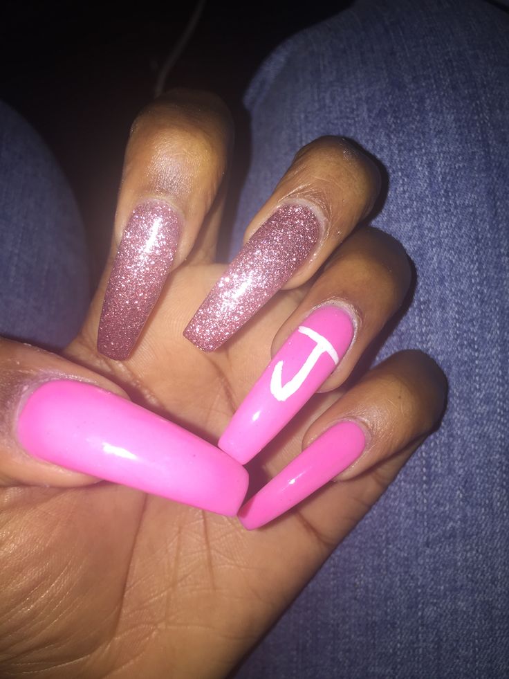 Elegant Pink and Glitter Nail Design with Accent Letter for a Chic Statement.