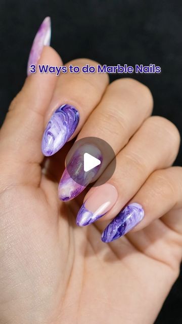 Sophisticated Purple Marble Nail Design: Trendy Artistry with Unique Shapes.