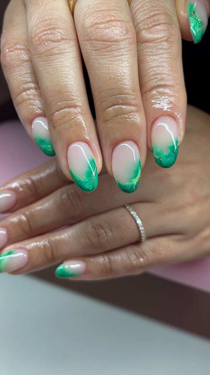 Elegant Green Ombre Nail Design: A Sophisticated Blend of Nude and Vibrant Hues for Any Occasion.