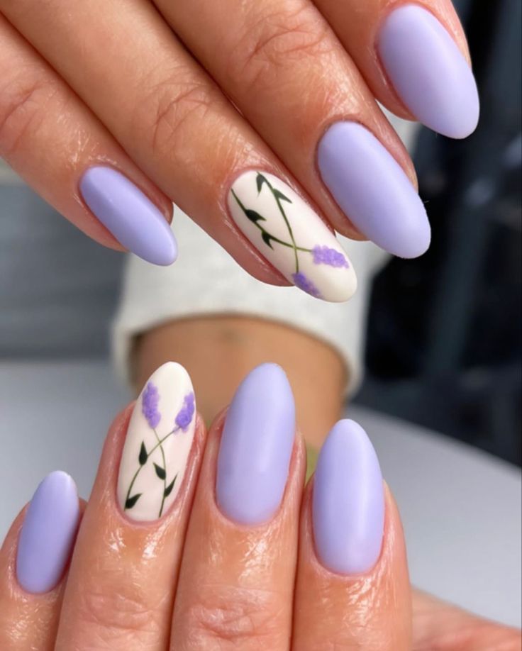 Elegant Lavender-Themed Almond-Shaped Nail Design with Floral Accents and Soft Matte Finish.